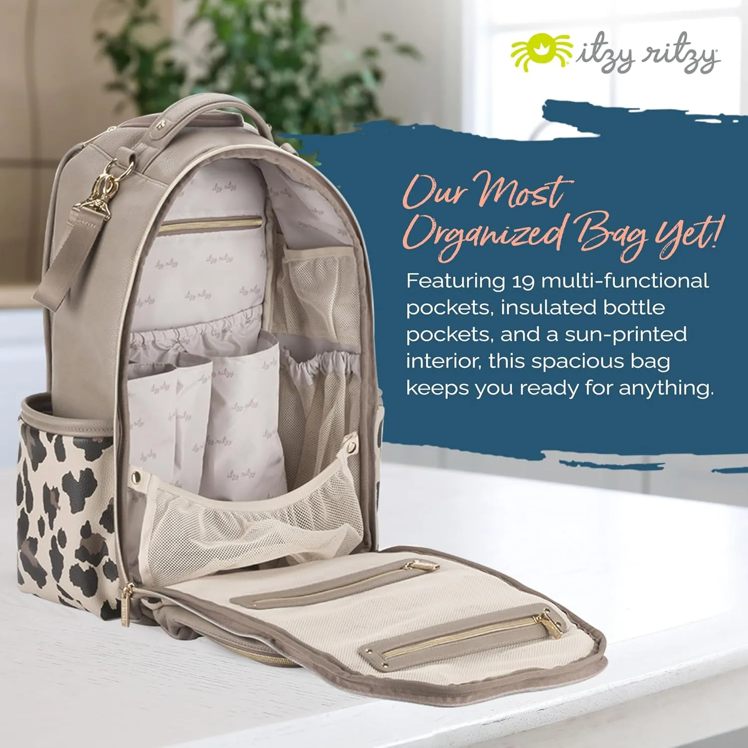 Itzy Ritzy Diaper Bag Backpack – Large Capacity Boss Plus Baby Backpack Diaper Bag Featuring 19 Pockets, Changing Pad, Stroller Clips, and Comfortable Backpack Straps, Leopard